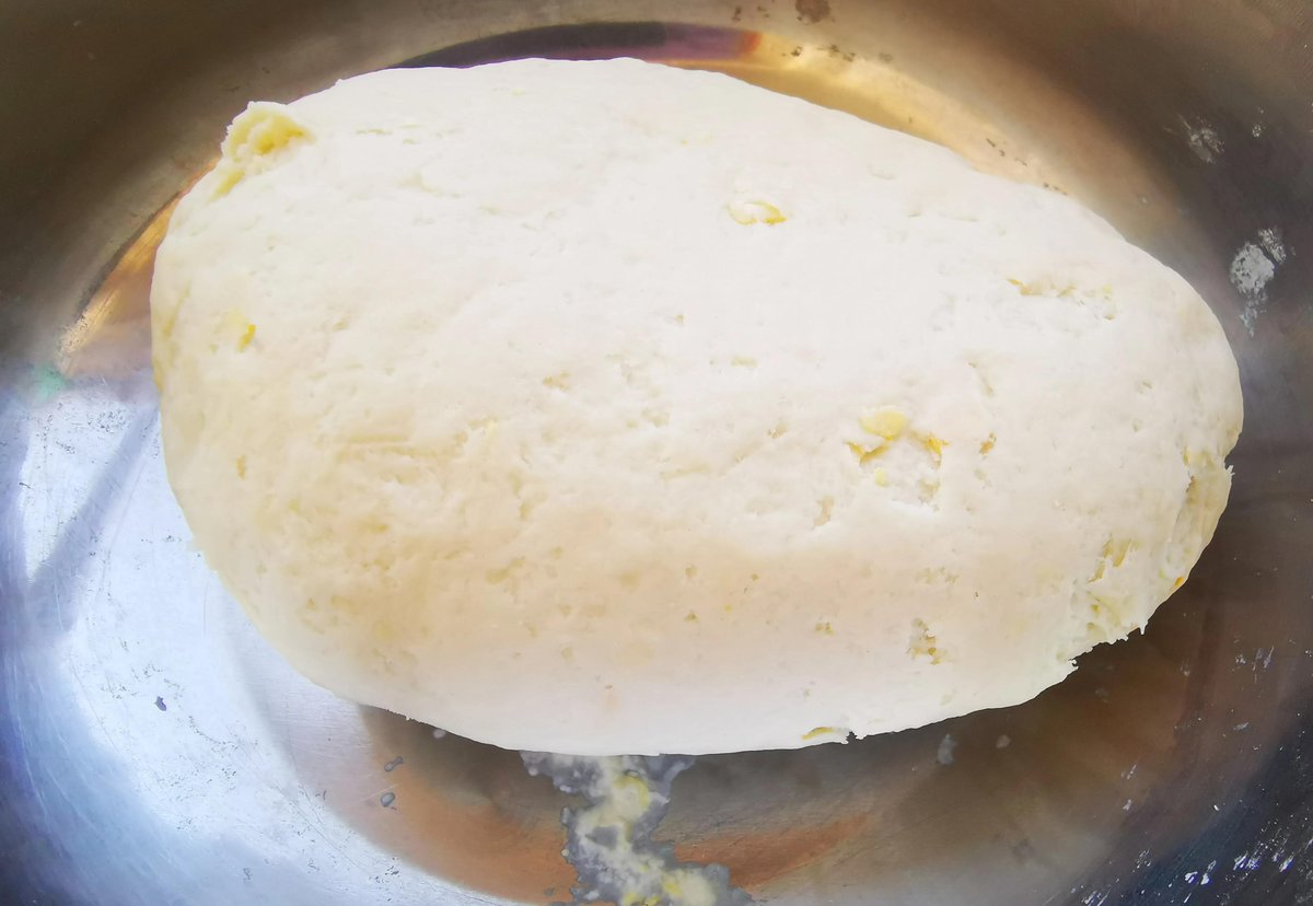 Biang Biang Noodles in the making — a ball of rested dough sitting in a stainless steel bowl, waiting to be pulled