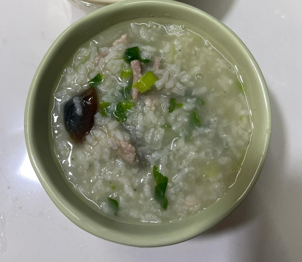 Century egg and pork congee (皮蛋瘦肉粥), the Shanghai breakfast the egg actually belongs to