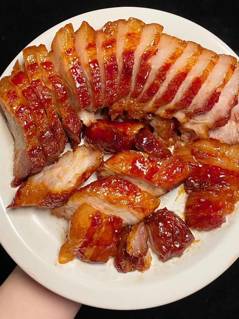 Char Siu — closeup of sliced pork showing the signature red exterior and juicy interior