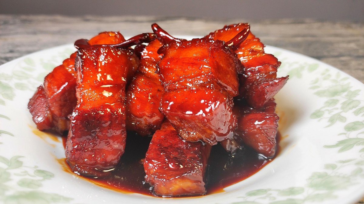 Hong Shao Rou — glossy caramelized pork belly in a clay pot, steam rising