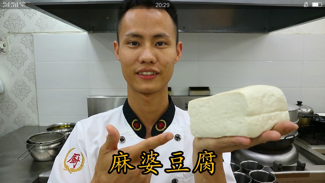 Mapo Tofu — the rich crimson sauce coating each cube of tofu