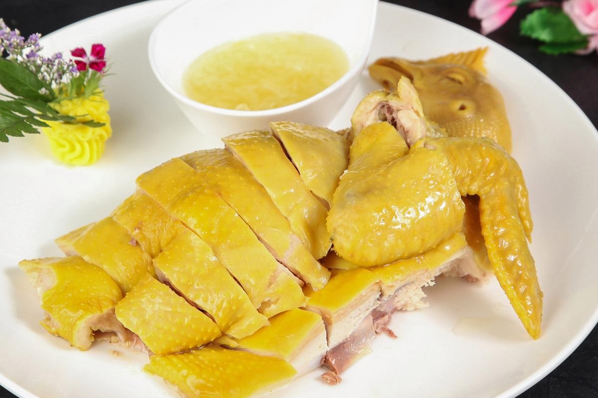 Salt-Baked Chicken chopped into pieces, served with the sand ginger dip
