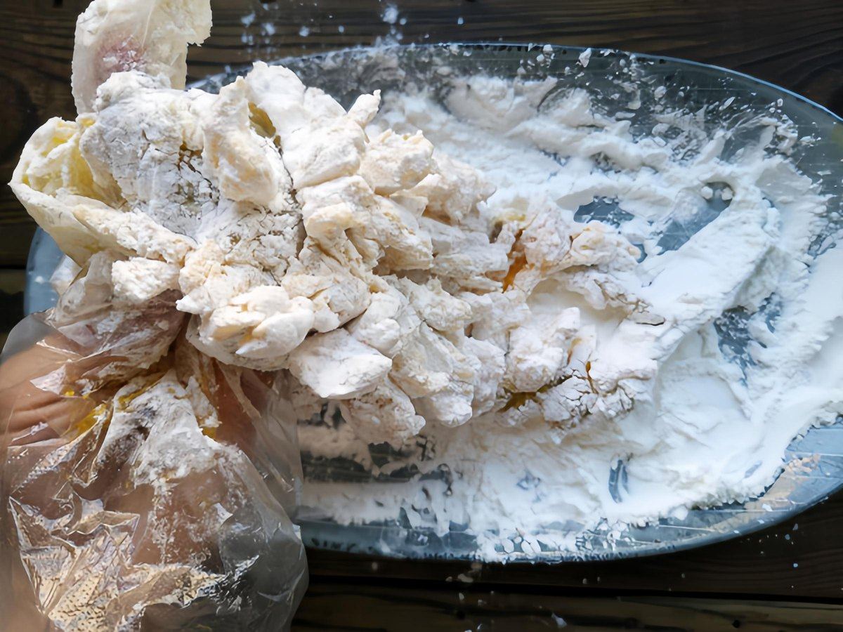 Squirrel Mandarin Fish — the scored fish dusted with dry cornstarch, crosshatched flesh opened out and ready for the oil